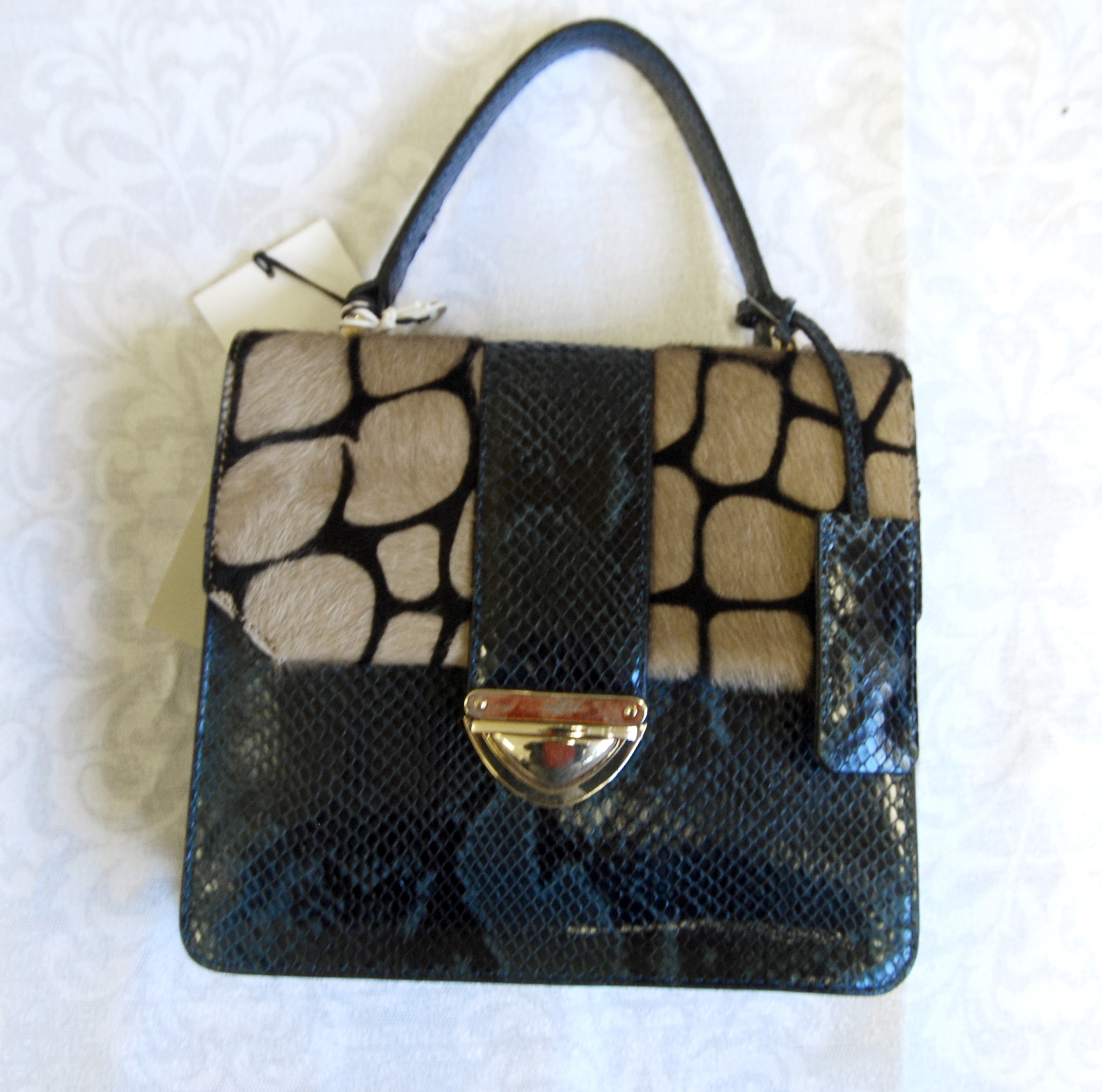 Porter Handbag by Vittoria Napoli
